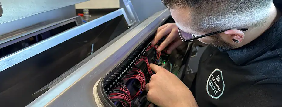 Service Tech working on electrical